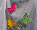 Krajkoví motýlci na voálu