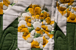 Prošití květu slunečnice - detail